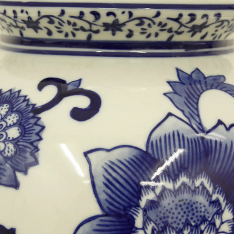 Close-up of blue and white floral ceramic design on Blue And White Floral Ceramic Table Lamp With White Cotton Shade Small Size On Off Switch 60W Max Bulb For Bedroom Nightstand Or Living Room Decor Accent Lighting For Cozy Nighttime Ambiance