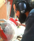 Person using power tools wearing Ultra Comfy 37 Db NRR Safety Ear Muffs For Shooting And Industry Work High Noise Reduction Earmuffs