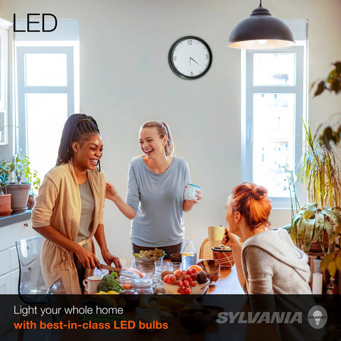 Three people in a kitchen lit by A19 LED Light Bulbs 100W Equivalent 16W Dimmable Frosted Medium Base Soft White 2700K 1600 Lumens.
