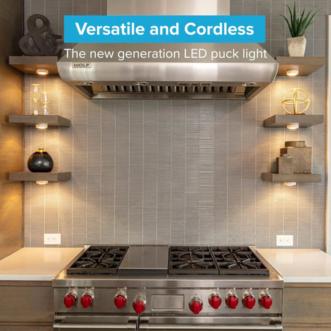 Wireless LED Puck Lights 3 Pack With Remote Control For Under Cabinet Lighting shown installed in a modern kitchen setup