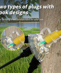 One Foot 12 Gauge 3 Wire Outdoor Extension Cord With Three Outlets Light Indicator on tree, close-up view of hook design.