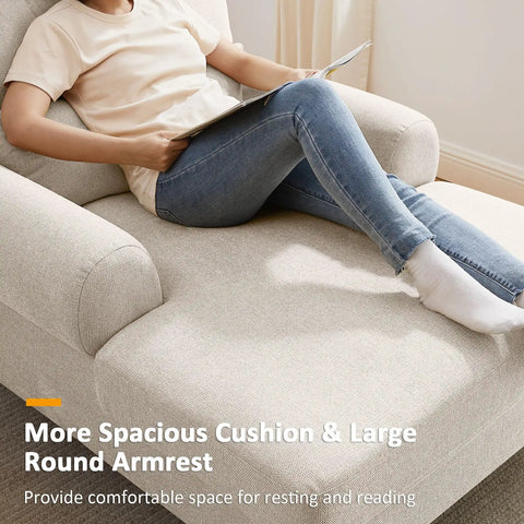 Person relaxing on smoke white indoor recliner sofa with deep seat, adjustable back chaise lounge chair with plush upholstery.
