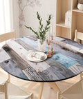 Round Fitted Tablecloth With Elastic Edge For Indoor And Outdoor Use Waterproof Wipeable Table Cover For 36 To 44 Inch Round Tables Farmhouse Style No Fuss Cleanup Dinner Picnic Patio Decor on a wooden table with white chairs