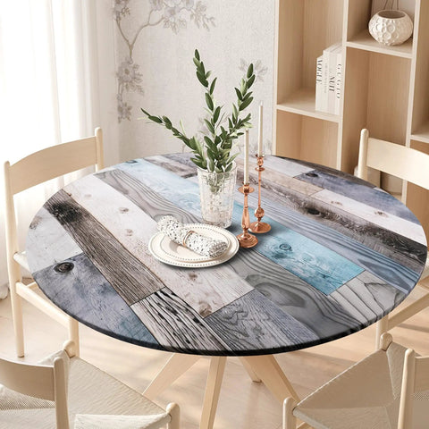 Round Fitted Tablecloth With Elastic Edge For Indoor And Outdoor Use Waterproof Wipeable Table Cover For 36 To 44 Inch Round Tables Farmhouse Style No Fuss Cleanup Dinner Picnic Patio Decor on a wooden table with white chairs