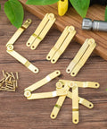 Gold Lid Support Hinge Set With 20 Screws, foldable rustproof 135-degree rotatable hinges for wooden boxes on a wooden surface.