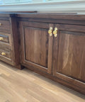 Solid Brass Cabinet Pull With Backplate, 6.5 Inch L-Shaped Handle In Polished Unlacquered Finish on wooden kitchen cabinets