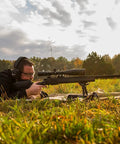 Man using Pivot Bipod 6 to 9 Inch Adjustable Notched Legs Slim Folding Design for Easy Transport, Rifle Stability, and Precision Target Shooting