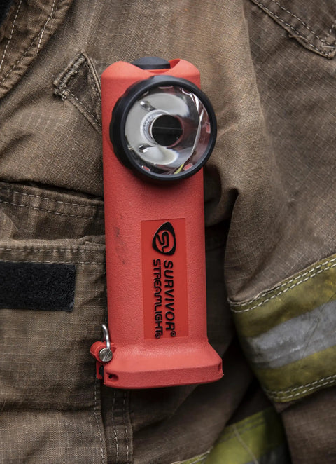 Survivor 175-Lumen Rechargeable Firefighter Right Angle Flashlight Intrinsically Safe Safety-Rated Orange without Charger clipped to jacket.