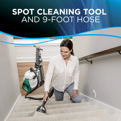 Woman using Big Green Professional Carpet Cleaner With XL DirtLifter PowerBrush on stairs with 9-inch long reach hose.