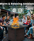 Group enjoying warmth around Outdoor Gas Fire Pit Table With 28 Inch Rattan Square Design Glass Wind Guard Tempered Glass Top Lid CSA Listed 50000 BTU Brown