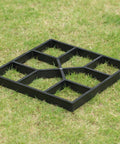 2 Pack Outdoor Pavement Molds For DIY Cement Stepping Stones Walkway Maker, black plastic mold on grass for patio path pavers.