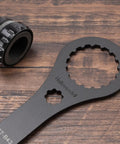 Bike Bottom Bracket Tool 16 By 44mm Install And Removal Wrench For Shimano Hollowtech II BB shown on wooden background