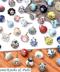 Slick Pomegranate Ceramic Drawer Knobs In Matte Black Finish For Kitchen Cabinets And Dressers Hella Sturdy Home Decor Pulls showcasing colorful ceramic knobs.