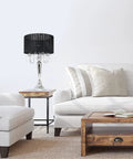 Trendy Romantic Sheer Shade Hanging Crystals Table Lamp in black with chrome finish in living room setup, 31 inch tall