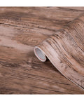 Roll of Rustic Wood Self-Adhesive Film Peel-And-Stick Wrap for walls and furniture with a warm vintage look