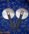Pair of 16 Gauge Steel Rondels With Genuine Leather Straps for Elbows and Knees Armor on decorative fabric