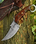 Handmade Damascus Steel Curved Fixed Blade Hunting Knife Nine Inch With Wooden Handle Ring Pommel Leather Sheath The Go To Tool