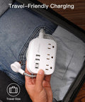 Flat Design Power Strip With USB Ports And 5 Foot Extension Cord Game Changer Travel Kit in hand, travel-friendly charging, compact design