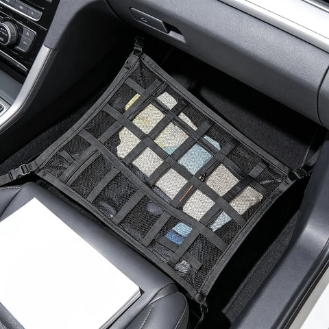 Ceiling Cargo Net With 3 Pockets And Double Layer Mesh Overhead Storage Organizer For Cars And SUVs used for floor storage inside vehicle.