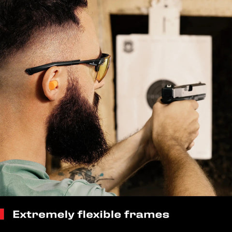 Man wearing Yellow Safety Glasses For Men, ANSI Z87 Rated Shooting Eyewear, aiming a pistol at target, SoftPad frames visible