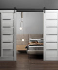 Quadro 4088 Double Sliding Barn Door Kit In Light Gray Oak With Frosted Glass 84 By 96 Inch Interior Door Solid MDF Core 13 Ft Black Rail Hardware Included Full Ready To Install Hardware Set in a modern living space.