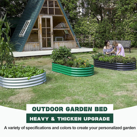 Three oval galvanized raised garden bed kits 4x2x1 ft installed outdoors, with vegetables growing, in a garden setting