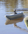 Dual Outriggers Standncast Gen II with 30in arm attached to small boat, Railblaza StarPort HD mount, providing side-to-side stability.