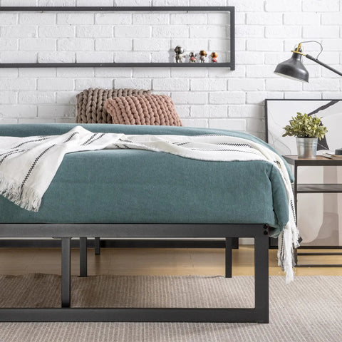Queen Size Metal Platform Bed Frame With Reinforced Steel Slat Support And Absolutely No Box Spring Required No Sweat Assembly Heavy Duty Durable Mattress Foundation Built Like A Tank with cozy bedding.