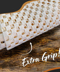 Close-up of PVC non slip rug pad roll with open weave design for extra grip on hardwood surfaces, labeled 'Extra Grip!'