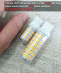 Close-up of G9 LED Bulbs 75W 80W 100W Halogen Equivalents, 1000 Lumen Soft Warm White with hand for size comparison.