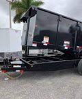 Side view of a black trailer lift showing frame and wheels, suitable for All In One Hydraulic Power Unit Replacement Kit installation.