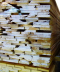 Stack of lumber using Classic Log And Lumber End Sealer Wax Emulsion Water Based Sealant That Keeps End Checks At Bay And Prevents Drying Splits