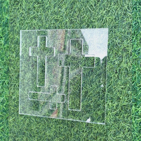 Hella Durable Cross Router Template For Woodworking And DIY Creations Solid Clear Acrylic Ribbon Crosses Inlay Jig with three sizes on grass.