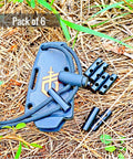 Six Pack 1 Inch Ferro Rod Fire Starter With Two Holes For DIY Paracord Bracelets on grass, shown with paracord tool case.