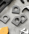 6 Pack Dang Tough Weld On Shackle Clevis Mounts 3 8 Inch Thick Heavy Duty Steel Brackets on gray surface with tools.