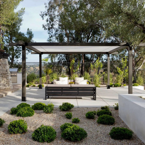 Pergola with 6x6 Post Base Set Of 4 With Inner 5.6x5.6 Post Anchors 13 Gauge Solid Steel Black Powder Coated in a garden setting.