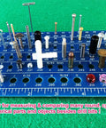 Holistic drill bit gauge (3-in-1) on blue plastic base with ruler and assorted bits, front view