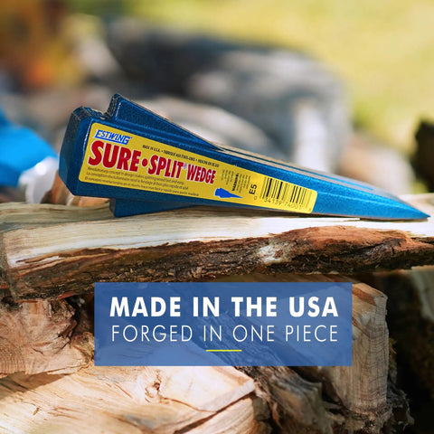 Sure Split Wedge 5 Pound USA Made Wood Splitting Tool With Forged Steel Construction resting on logs