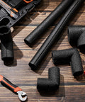 Top Shelf Foam Pipe Insulation Sleeves With Elbow Fittings For Hot And Cold Water Lines Thermal Wrap To Keep Those Pipes Cozy 16 Piece Set laid out on a wooden surface.