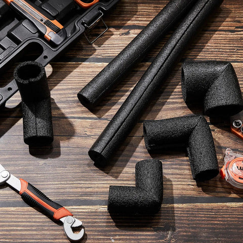 Top Shelf Foam Pipe Insulation Sleeves With Elbow Fittings For Hot And Cold Water Lines Thermal Wrap To Keep Those Pipes Cozy 16 Piece Set laid out on a wooden surface.