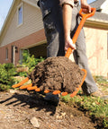 Person using All Poly Scoop Fork With 8 Tines And D Grip Handle For Mulch Compost Leaves Straw And Hay Lightweight Beveled Tines