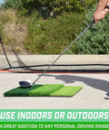Tri Turf XL Golf Hitting Mat 24x24 Inches For Indoor And Outdoor Practice in backyard with golf club on mat