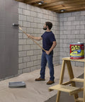 Man applying Liquid Rubber Coating Sealant For Roofs And More, Waterproof, Flexible, Breathable, And UV Resistant, Easy To Brush Roll or Pour.