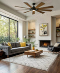 Top Shelf Large Ceiling Fan With Classic Americana Vibes And A Real Deal Heavy Duty Steel Build Featuring A Sharp Distressed Black Finish And Smooth Operator Airflow For Bold Interior Spaces in a living room.