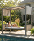 Woman relaxing on Three Seat Porch Swing With Stand And Cozy 990 LB Capacity 2 In 1 Convertible Bed And Swing Canopy Adjustable Outdoor Wicker Side Panels Cushioned Patio Chair For Backyard Porch Garden Gray by poolside.