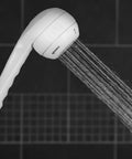 Sm451E 1.8 GPM PowerSpray Plus Shower Massage Head Upgrade with water flowing, handheld feature, white color, bathroom setting