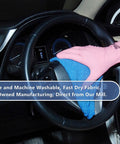 Hand in pink glove cleaning car steering wheel with Blue 12x14 Inch Shop Towels Pack Of 50 Plus 5 Bonus Reusable Cleaning Rags For Garage Auto Painting Kitchen Bar Tough As Nails 100 Percent Cotton Absorbent Towels Workhorse