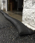Grab And Go Flood Kit With Five 10ft Flood Barriers In A Bucket Water Activated And Ready To Use No Sand Needed blocking doorway