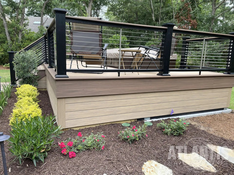 Garden view of deck with black railing using Swivel End Fittings For Cable Railings Five Thirty Second Inch 316L Marine Grade Stainless Steel Ten Pack.