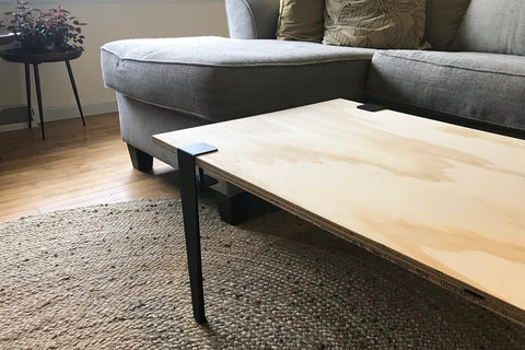 Set Of Four Adjustable Table Clamp Legs For 16 Inch Coffee Tables, Powder Coated Steel Build, Supports Up To 200 Lbs, attached to wooden top
